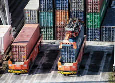 Photo of containers in a shipping port.