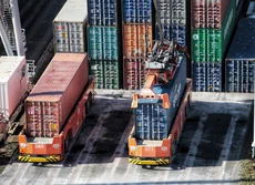 Photo of containers in a shipping port.