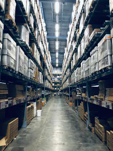 Photo of the interior of a warehouse.